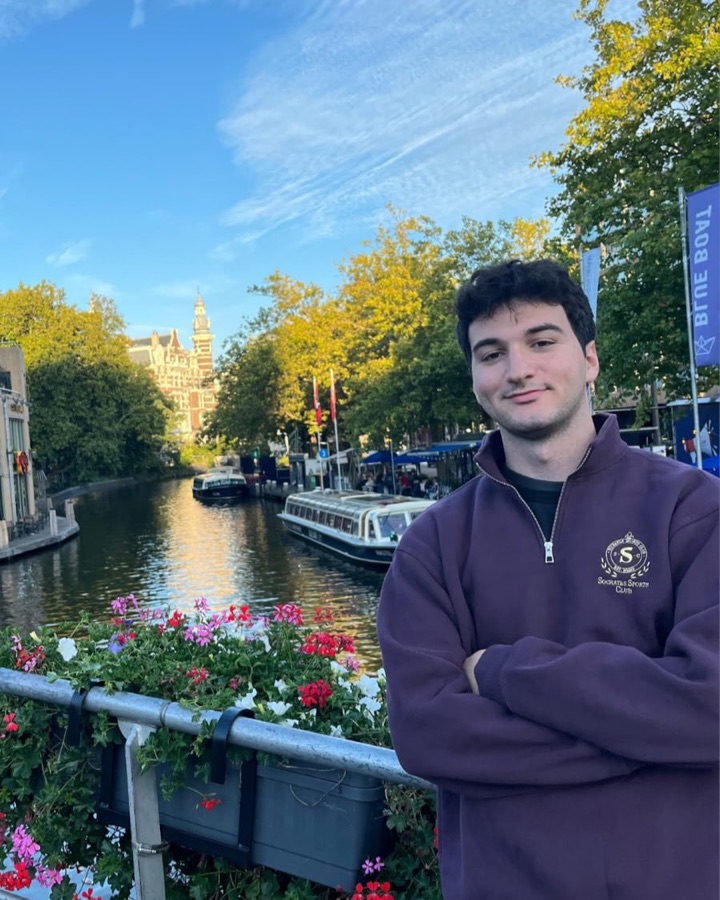 Yusuf Sami outdoors by a canal